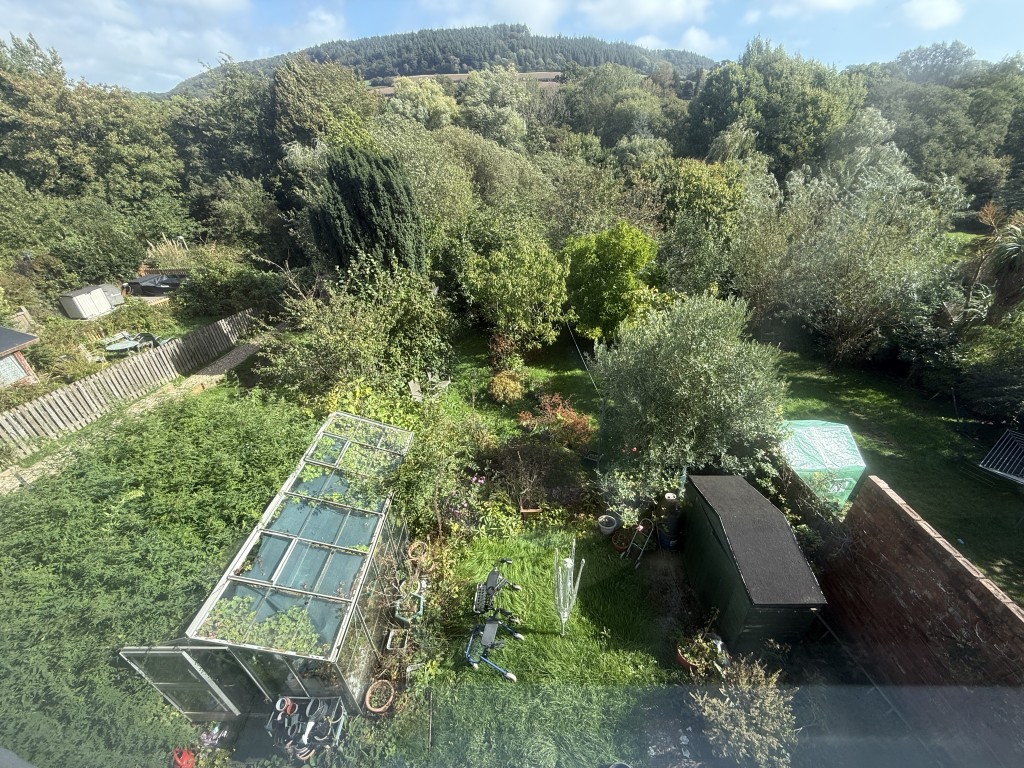 Lot: 109 - DETACHED COTTAGE IN VILLAGE LOCATION FOR UPDATING - View of the rear garden and view from the upstairs rear window